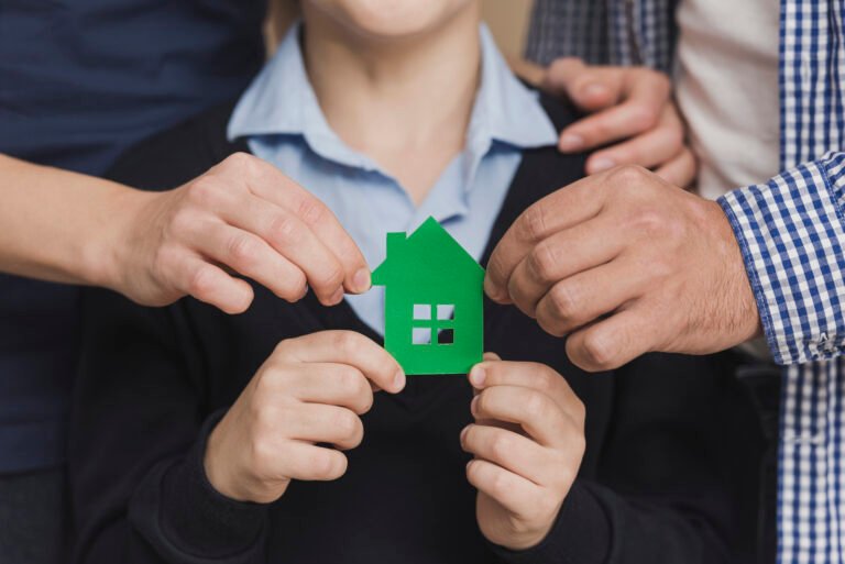 close-up-parents-touching-son